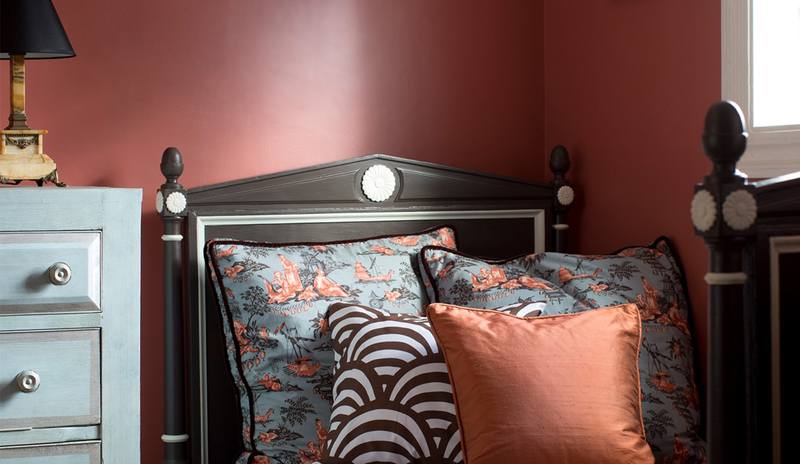 Bricktone Red paint color on bedroom walls
